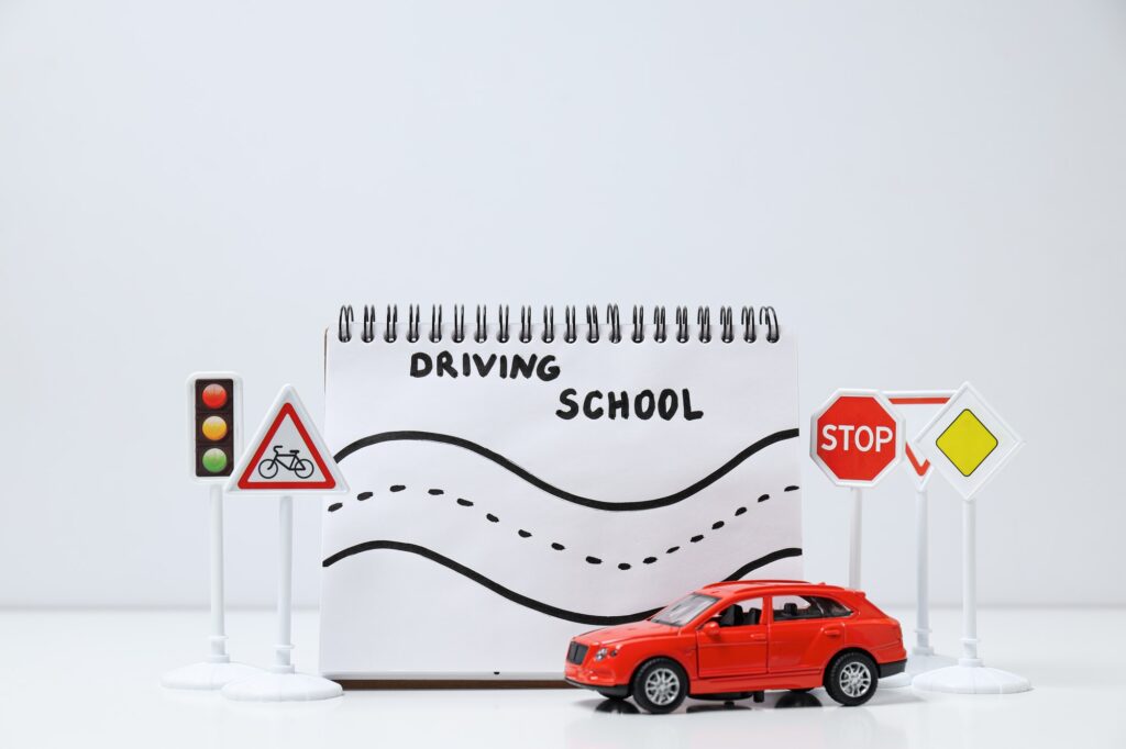 Driving school and driving lessons concept, education concept